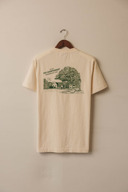 Ivory tee with green clubhouse graphic