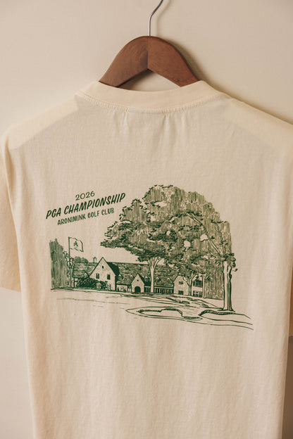 Ivory tee with green clubhouse graphic